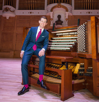 James Kennerley at the Kotzschmar console. Photo by Jill Brady