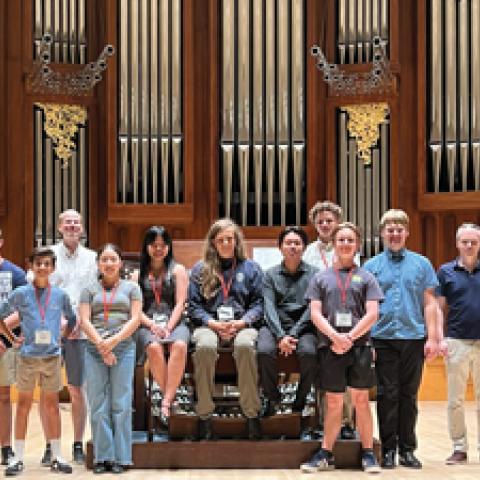 Instructors Eugene Lavery and Jens Korndörfer with the nine camp students and two councilors