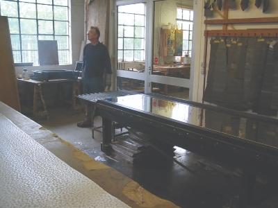Casting pipe metal, Rudolf von Beckerath, Hamburg, Germany (photo credit: John Bishop) Casting a metal pipe